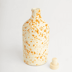 Image showing the Splatter Ceramic Bottle, 500ml, Burnt Orange product.