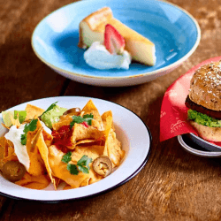Image showing the Cocktail Masterclass and Three-Course Meal for Two at Revolution Bars product.
