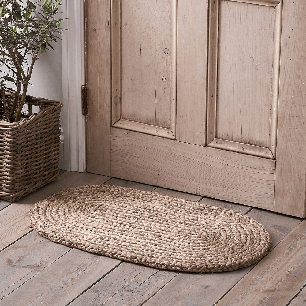Braided oval doormat, 77 x 46cm, natural jute