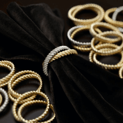 Image showing the Deco Twist Napkin Rings, Mixed Gold & Platinum, Set of 4 product.