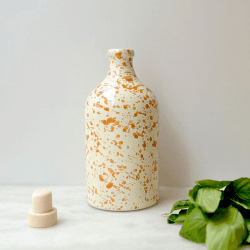 Image showing the Splatter Ceramic Bottle, 750ml, Burnt Orange product.