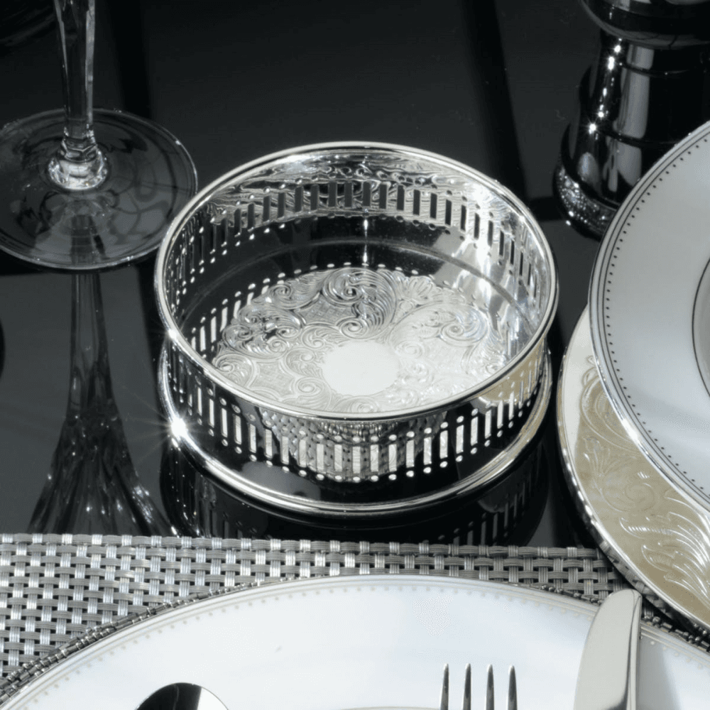 Bottle coaster with roll chased metal base, Silver Plate