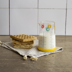 Image showing the Glass Glass Measuring Cup With Silicone Base, 500ml, Yellow product.