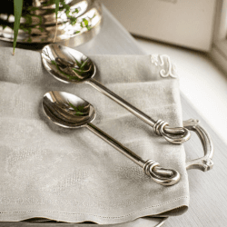 Image showing the Polished Knot Pair of serving spoons, 24.5cm, Stainless Steel product.