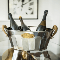 Image showing the Heritage Champagne bath with leather handle, 19 x 49 x 30cm, Stainless Steel, Brass And Leather product.